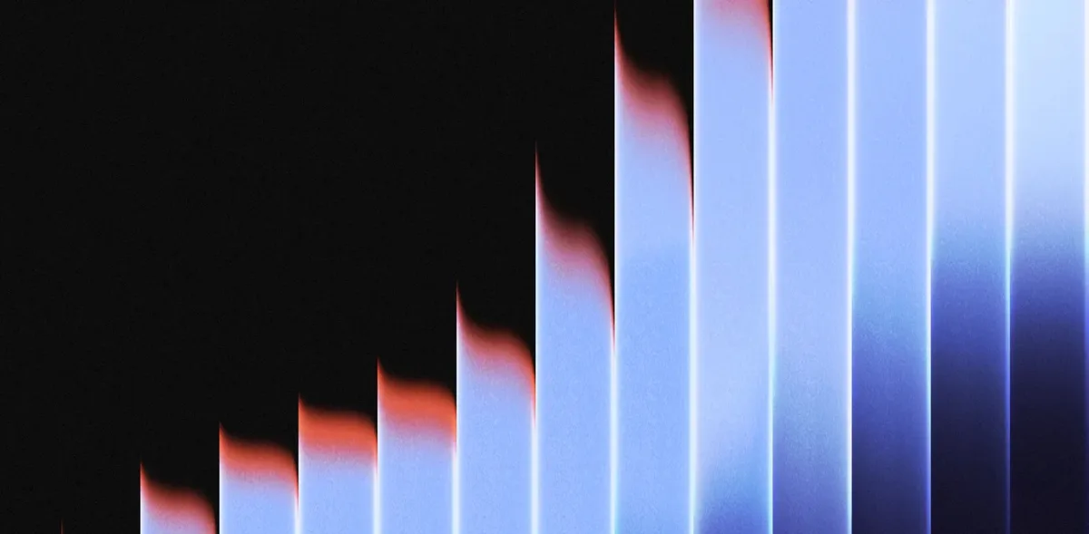 Stacked glass artwork, wide: blue glass panes rising from left to right over a dark field